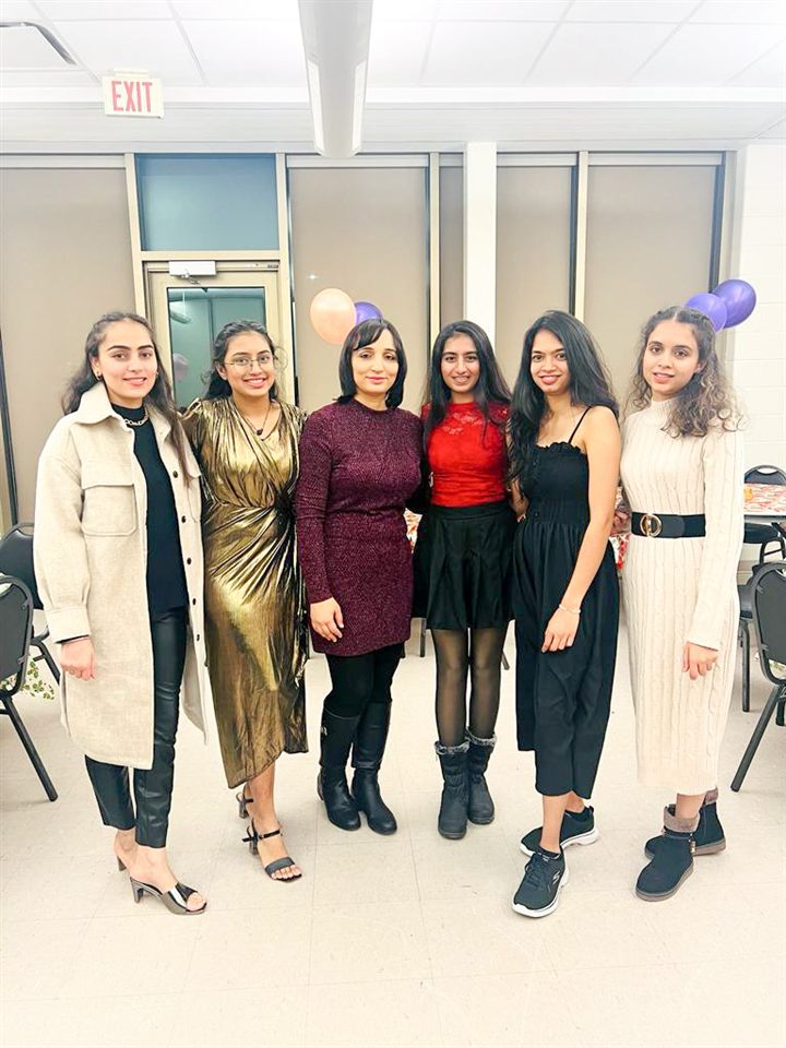 Ravinder Kaur Sidhu celebrating together with the team she built